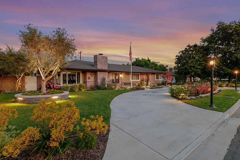Charming house exterior at sunset.