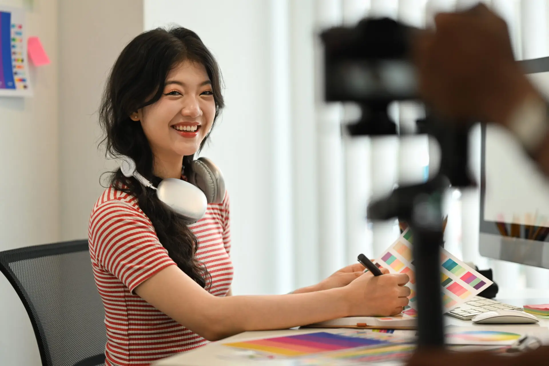 Woman working on color design at desk