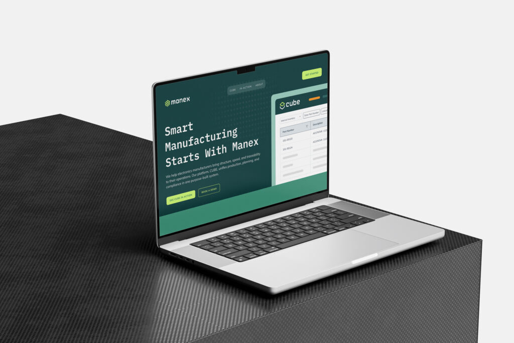 Manex website on laptop